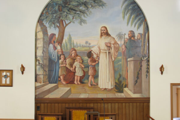 Mural depicting Jesus blessing little children